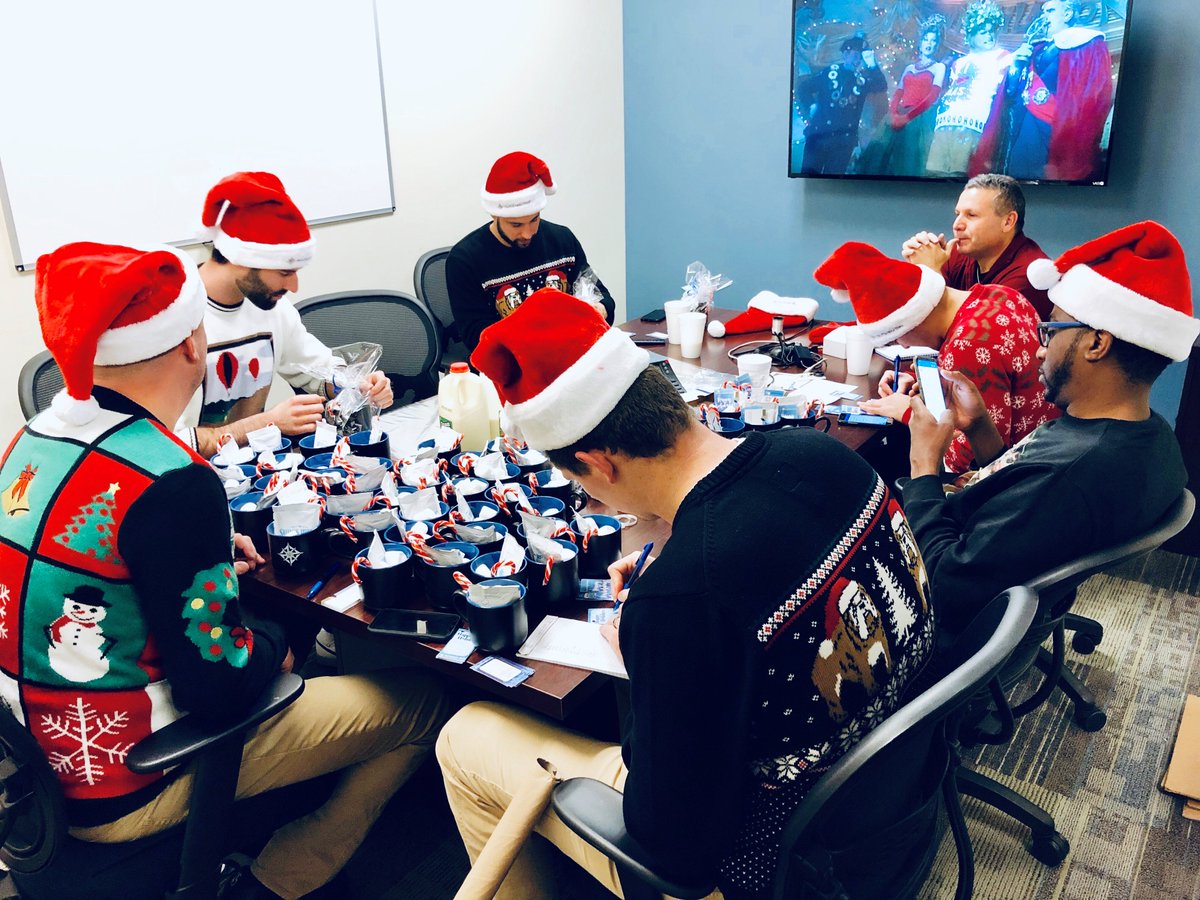 NorthpointeBank's tweet photo. The Grand Rapids loan officers are busy wrapping presents for clients! #BusyElves #SantasWorkshop #HappyHolidays #NorthpointeBank https://t.co/DijBA0CTcu