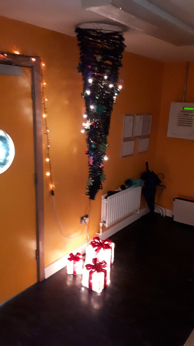 We couldn't find the stand for one of our Christmas trees so we improvised