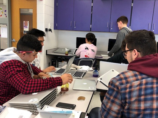 Kathy__Tyler's tweet photo. Hard working PHS Computer Maintenance students help keep district devices clean and updated.  They also help organize the wiring and chargers in the carts. https://t.co/varyla3nLG