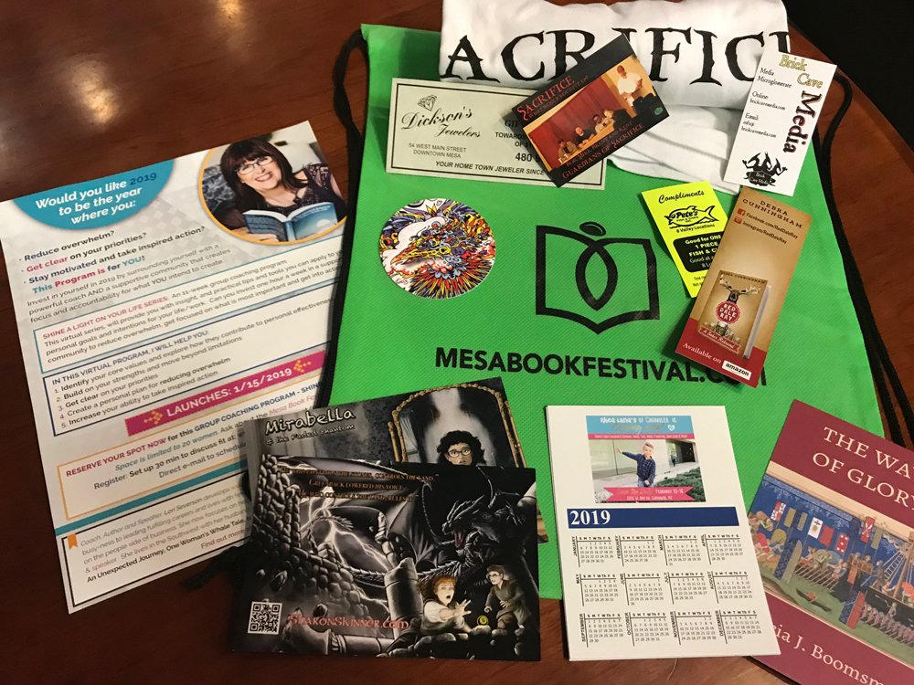 MesaBook's tweet photo. The Mesa Book Festival had pretty good attendee bags last year- and this year they have gotten even better- some bags have special additions like T-Shirts. make sure your first stop is to the Information  table to claim your bag this Saturday: https://t.co/nklfZgnfh5 https://t.co/RtkLqUZitn