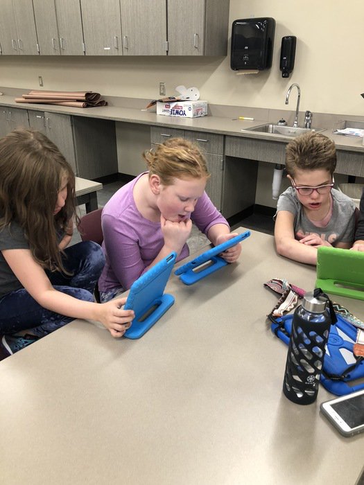 DivideCounty's tweet photo. Students loved participating in the statewide hour of code today! Look how focused they were!  #HourOfCodeND #engagedatDCE #codesomemore #thumbsup https://t.co/bVQuwE6Lkn