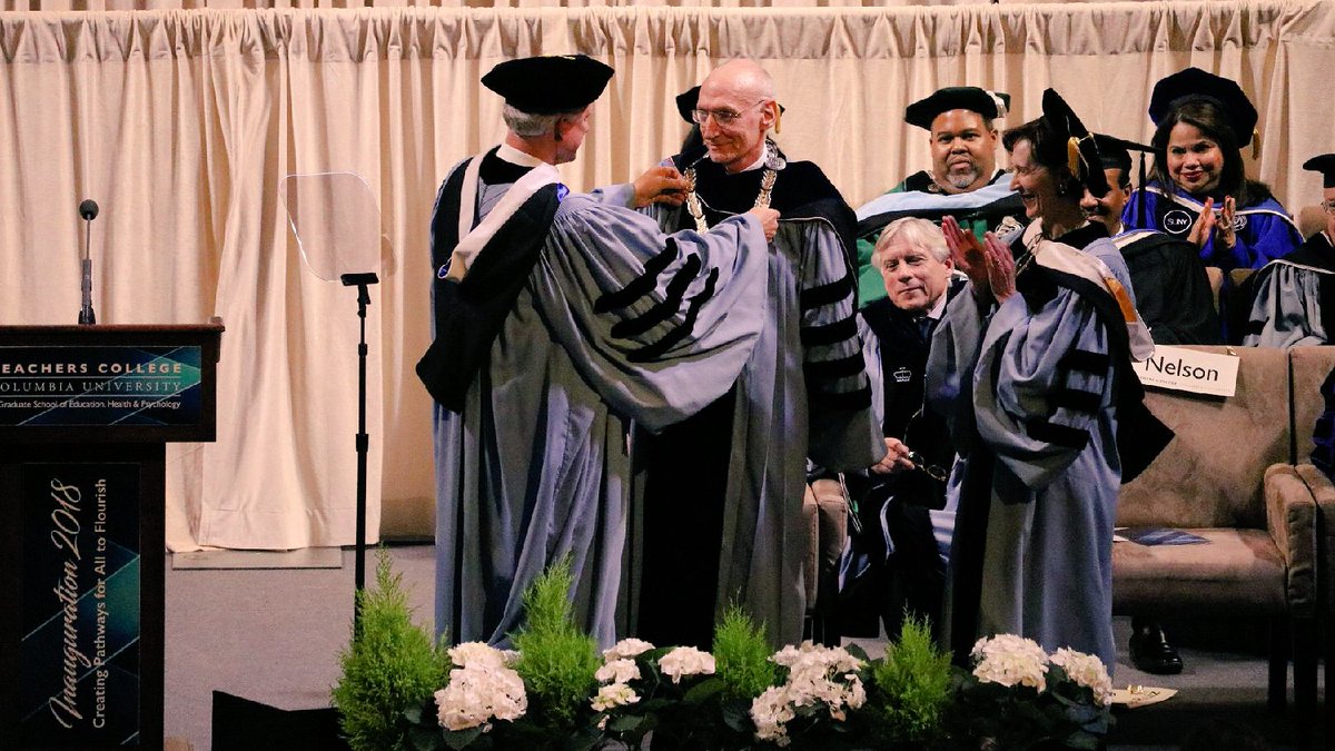 TeachersCollege's tweet image. Chair of the Board of Trustees Bill Rueckert and Trustee Leslie Morse Nelson now present President Bailey with the Chain of Office, a tradition among universities that dates back to the Medieval period. #TCInauguration