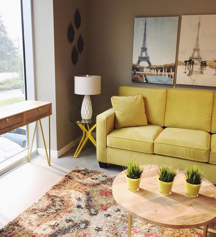 On those days when you need to create your own sunshine - a yellow sofa!!  (Photo by Van Gogh Designs) #artofinteriors #yellowsofa #sunshine #interiordesign #vangoghdesigns #canadianmade