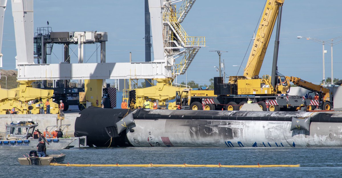 FLAsteve321's tweet photo. Stopped by the Port Canaveral to see the floating SpaceX Falcon 9 booster. It landed in the ocean just off the coast of Cape Canaveral. Grid fin hydraulic pump stalled so the booster could not stop spinning. #rocketboat #spacex #space #nasa #portcanaveral #capecanaveral https://t.co/Z7cK2QO331