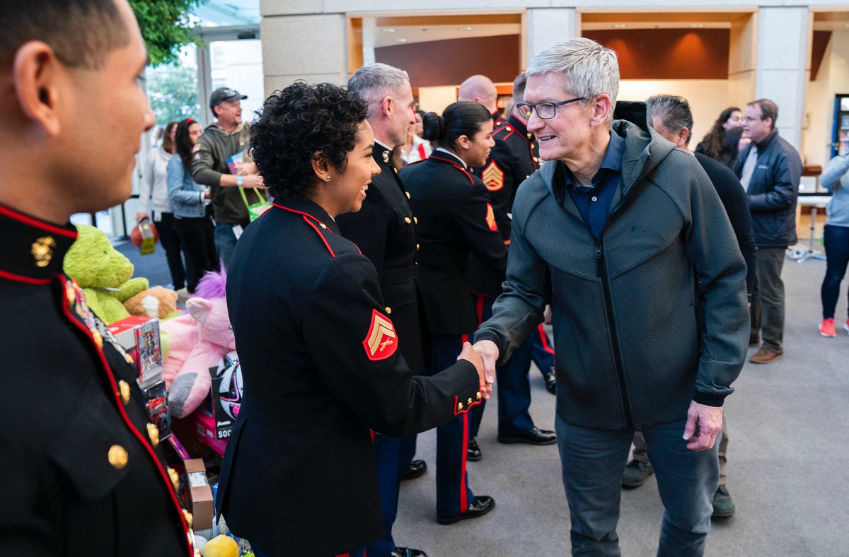 tim_cook's tweet photo. One of my favorite holiday traditions — our annual @ToysForTots_USA celebration. Thanks @USMC for your service to our country and for spreading holiday magic to children in need. https://t.co/P7syRpP14v