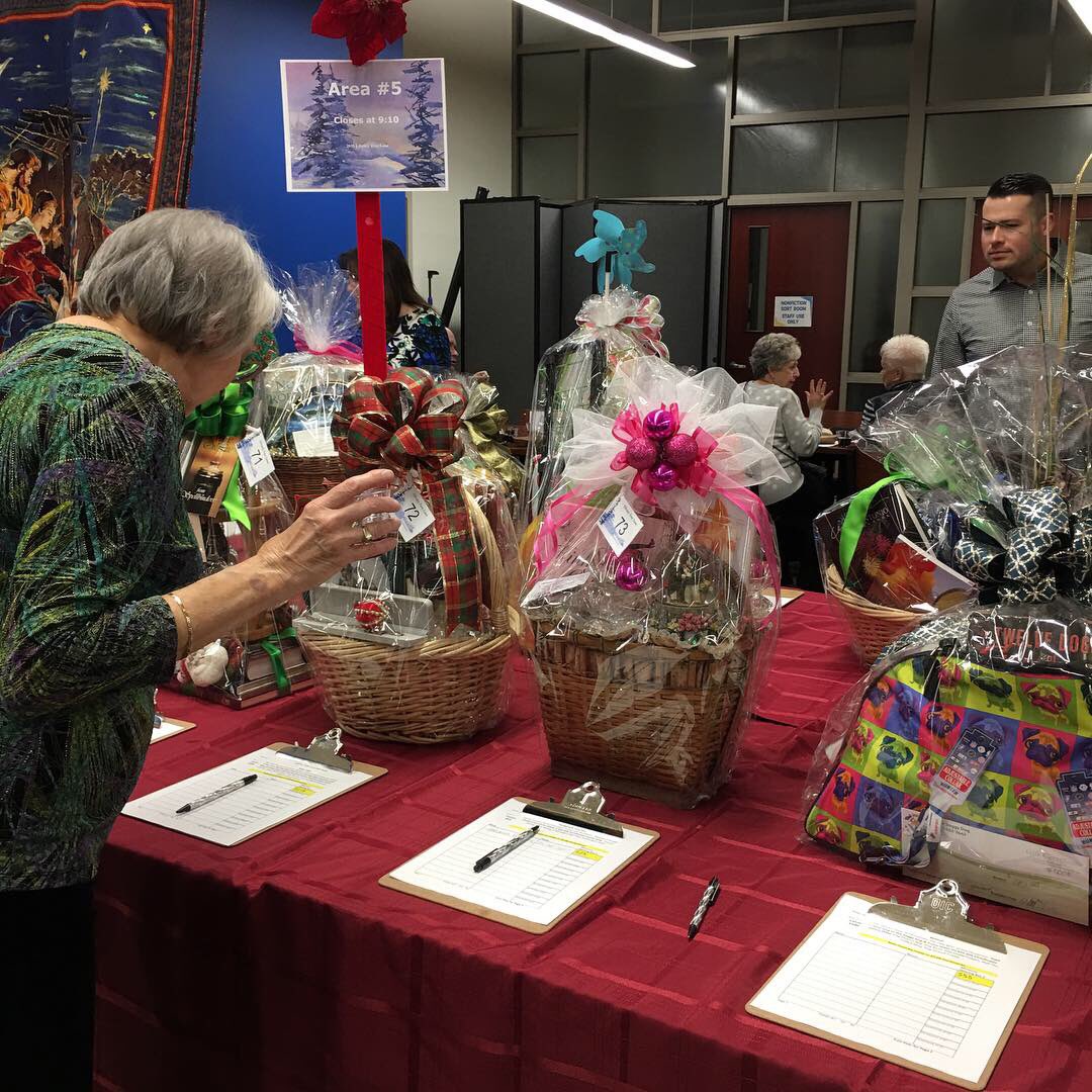 hendersonlibs's tweet photo. So many great baskets to bid on! #LibraryTreeLane #HendersonLibraries https://t.co/BwbI7K78mb