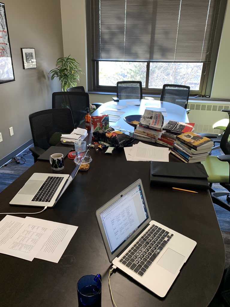 acaguy's tweet image. Doing rhetorical criticism in the com studies conference room with @Kyle_R_Larson. Please excuse my junk food habit.