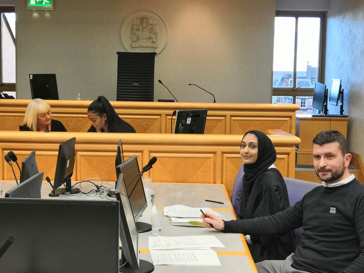 RacShe1001's tweet photo. Here Alishah Ahmed is preparing (with the help of the brilliant volunteer defence lawyer, Graeme) to present her case the jury and clear Iqra Younis of her assault charges. Dina Abdullah acting as Clerk of court in the background. #modernstudies #minitrials @GracemountHigh https://t.co/nJGPYMCJoK