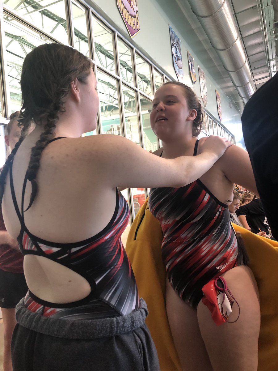 tonkaswim's tweet photo. Senior Captain Halle Clapham giving another Captain Emily Reed a pep talk before her 500 Free https://t.co/FyODtIZM9T