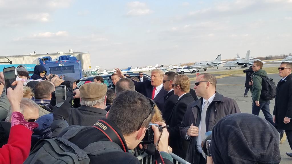 DailyK's tweet photo. President Trump greets supporters after landing in Philadelphia for the Army-Navy game. https://t.co/7rpY5Xb6hR