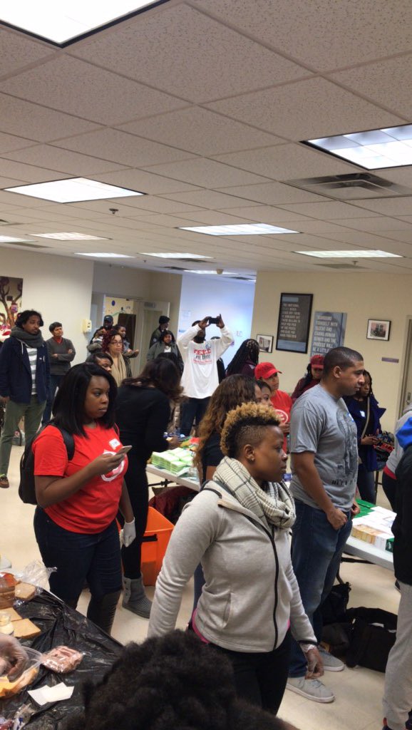 WBAYLD's tweet photo. #WBAYLD consistently has programs and panels but something we really love is serving the community! Pictured here are YLDers passing out “know our rights” cards as part of the #FeedTheHood initiative. https://t.co/MBbkLRS13G