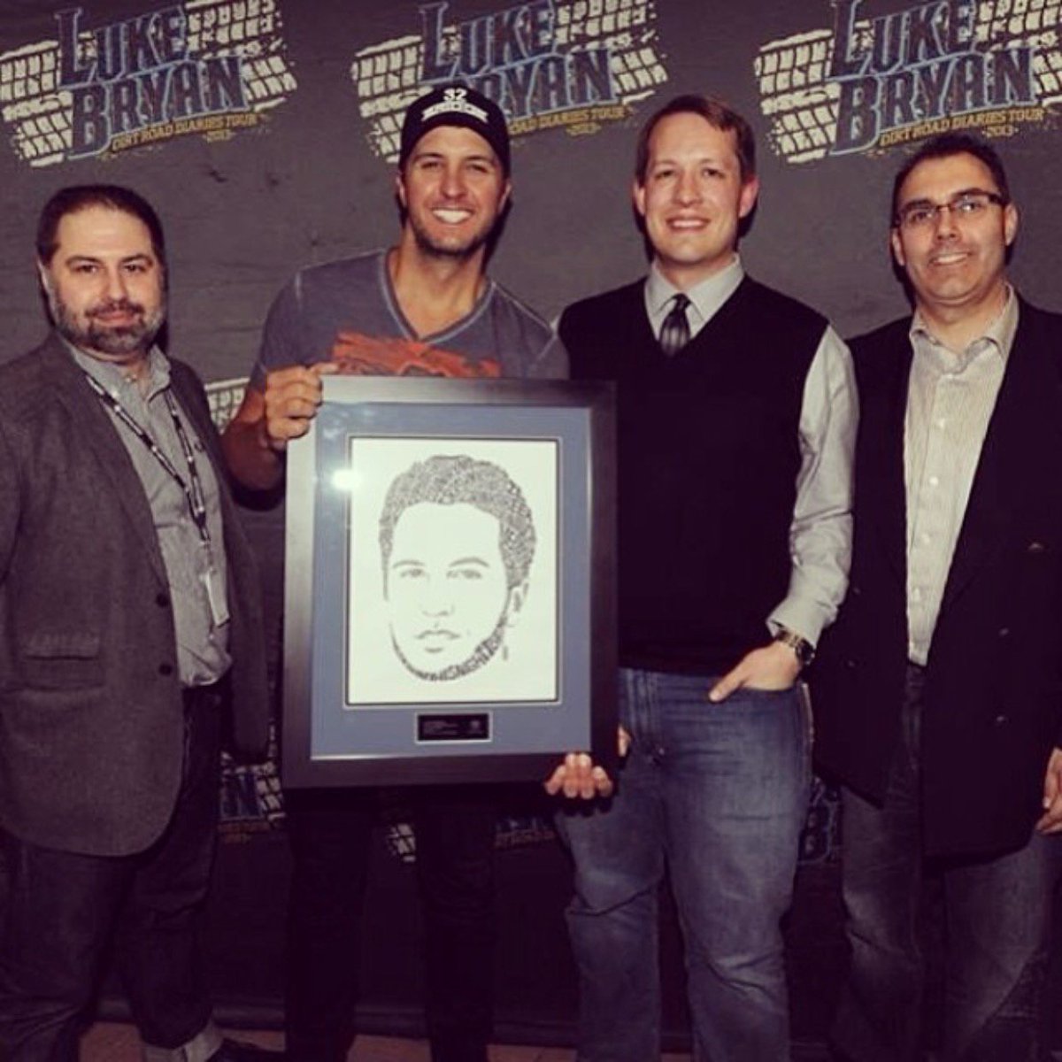 seanings's tweet photo. Throwback to my artwork being presented to #LukeBryan #seanings https://t.co/Wp4Yswqljh