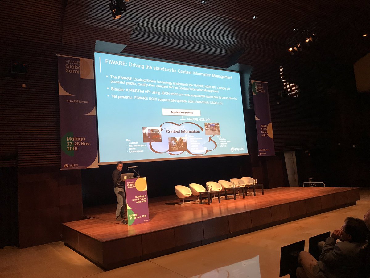 FIWARE's tweet photo. Jason Fox, Senior Technical Expert and Evangelist of the FIWARE Foundation, kicks off the Developers Track in Auditorium 2 on the ground floor with an Overview of #FIWARE! Don’t miss the Developers Track today! #FIWARESummit Presentations about NGSI, OPC UA and more to come! https://t.co/cN56BmaDUP