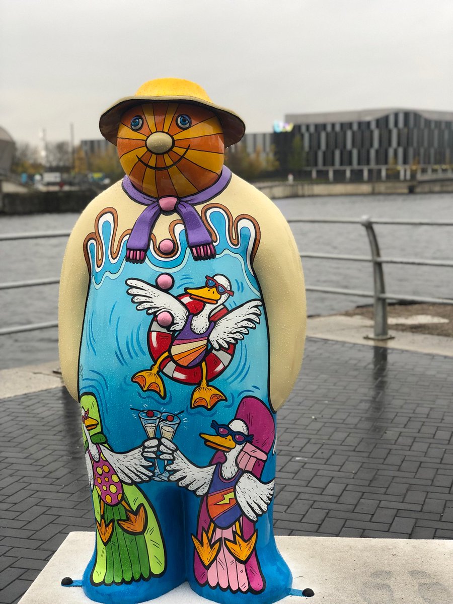SnowmanWalk6's tweet photo. It might be raining but nothing will stop me trying to sunbath on the Salford Quays Riviera 👌🏻. Come and say below - I’m behind the Lowry. https://t.co/AfyQubeDJB