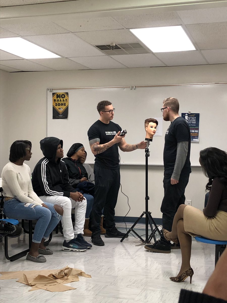 EMPOWERmentAca2's tweet photo. Today, students and staff from Sylvain Melloul International Hair Academy came to talk about their wonderful programs! Our Warriors got to practice on mannequins and a few even got haircuts! We love career days at EA! Check out the poster for a free cut! @smiha5 @ReinvestLCS https://t.co/vdFhJijEXi