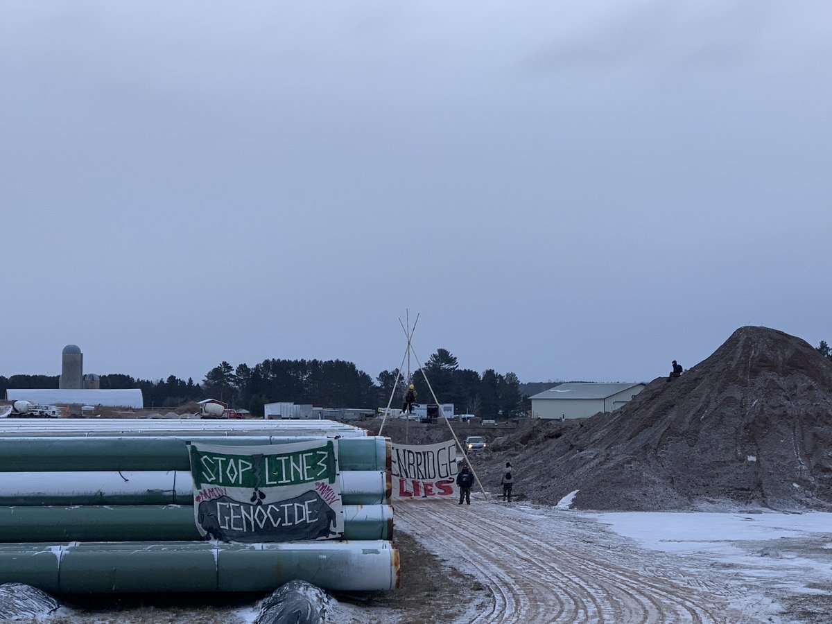 BREAKING: Enbridge hiding Line 3 pipes behind gravel pit in illegal yard outside of Atkinson, Minnesota! Water protector locks down in tripod to expose Enbridge lies and stand for the Great Lakes! #StopLine3 #EnbridgeLies