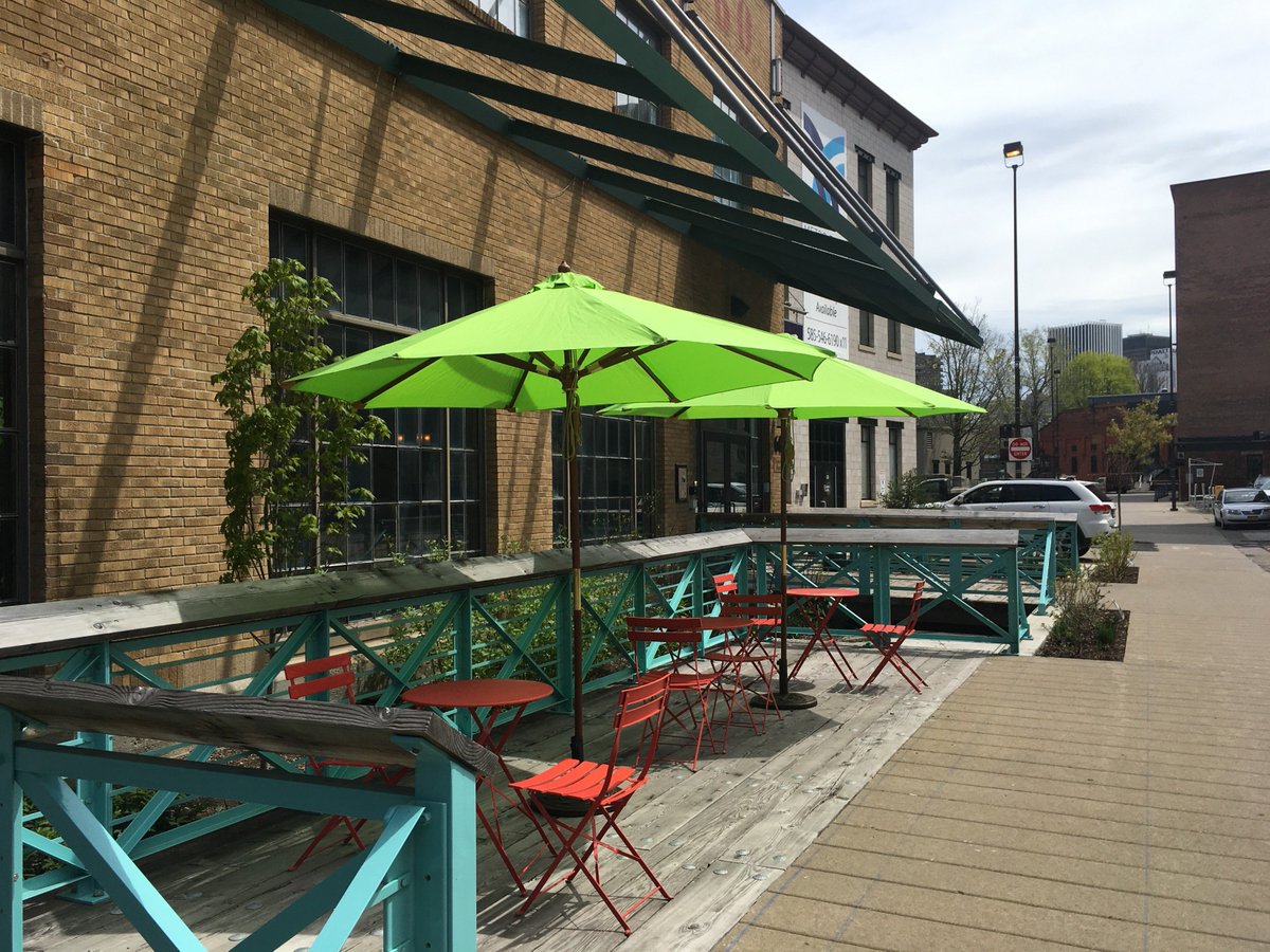High Falls residents use the FlourGarden to read, have lunch, and catch up all summer. Support our placemaking work on ROC the Day so we can continue to make High Falls a more vibrant and exciting neighborhood! roctheday.org/Causes-to-Supp…