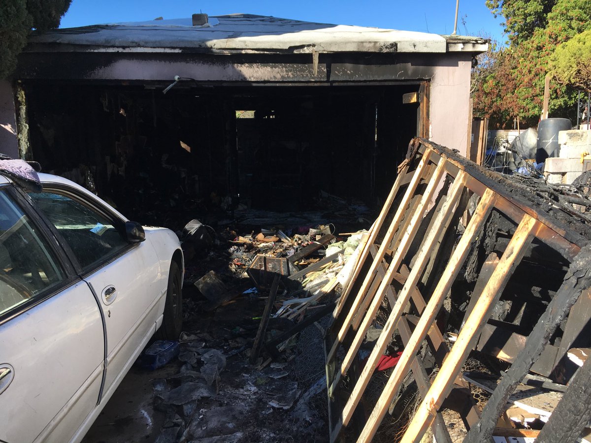 photog_sreusch1's tweet photo. #Fire burns the inside of a garage which had squatters living inside. 3rd time this has happened! @10News #10beards https://t.co/akotielxMN