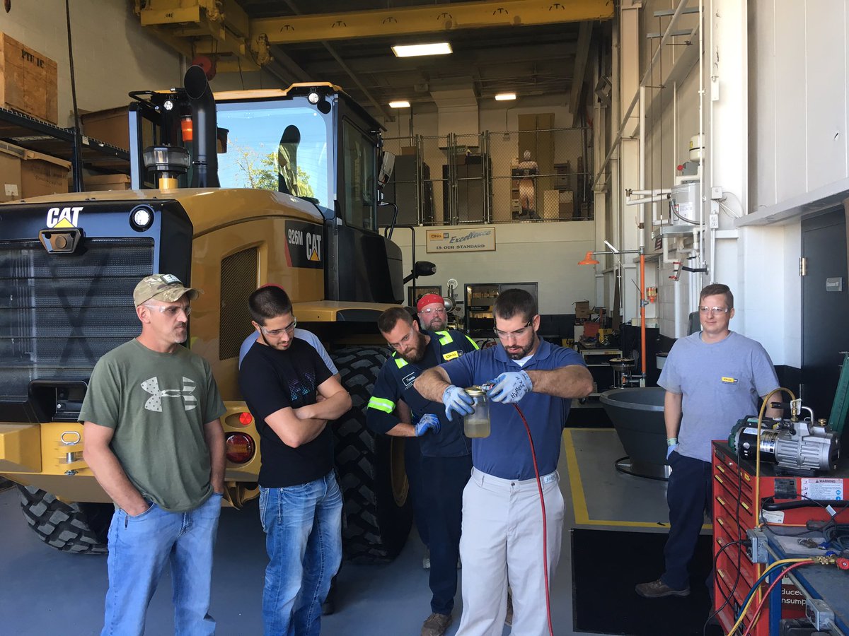 OhioCAT1's tweet photo. Did you know we offer training? Here, Zach Branch instructs a Mobile Air Conditioning Service class. Contact us for #equipmentoperator and maintenance training.       #heavyequipmentlife  #thingstodoinwinter  #catequipment #letsdothework #constructionequipment #mechanictraining https://t.co/F1RpeI571j