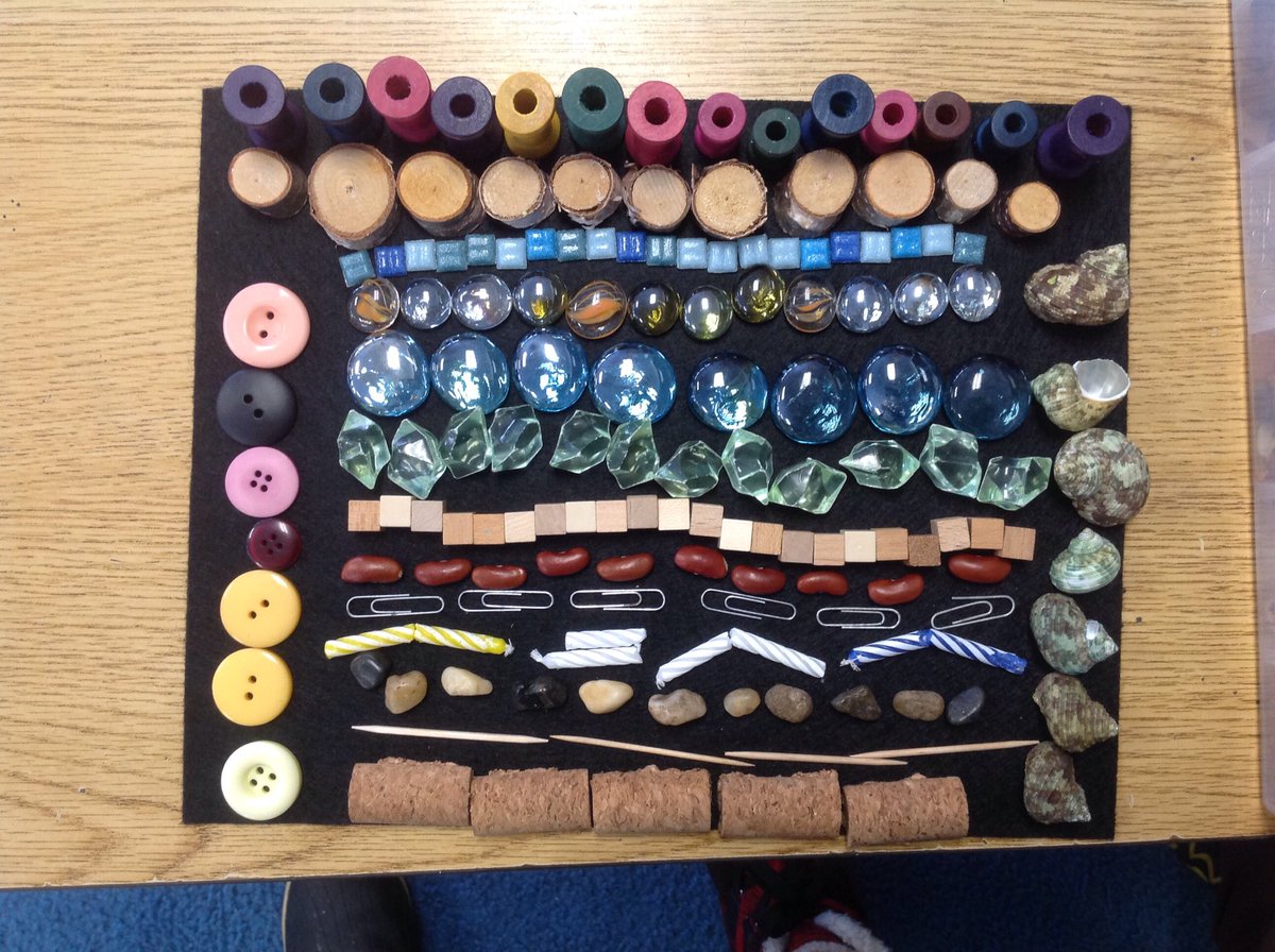 This is made with things I used from the tinker box.  The tinker box is a box with many things that you can discover and use to make patterns. -- E.M.