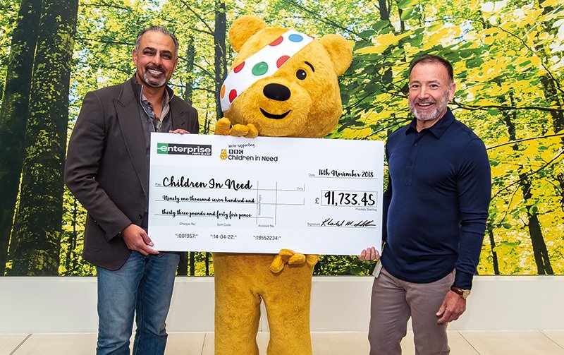 ERACTeamPudsey's tweet photo. A very proud moment for @UKEnterprise's Khaled and Mike handing #pudsey a cheque for @BBCCiN to help young people throughout the UK https://t.co/06bEgrBTUx