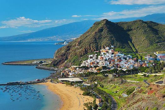 Tenerife Island is not just a place to relax on the beach. The largest of the Canary Islands, it has a truly extraterrestrial scenery. Mount Teide, located here — is the highest point in Spain, which has become the center of an amazing natural park. The coast of the island