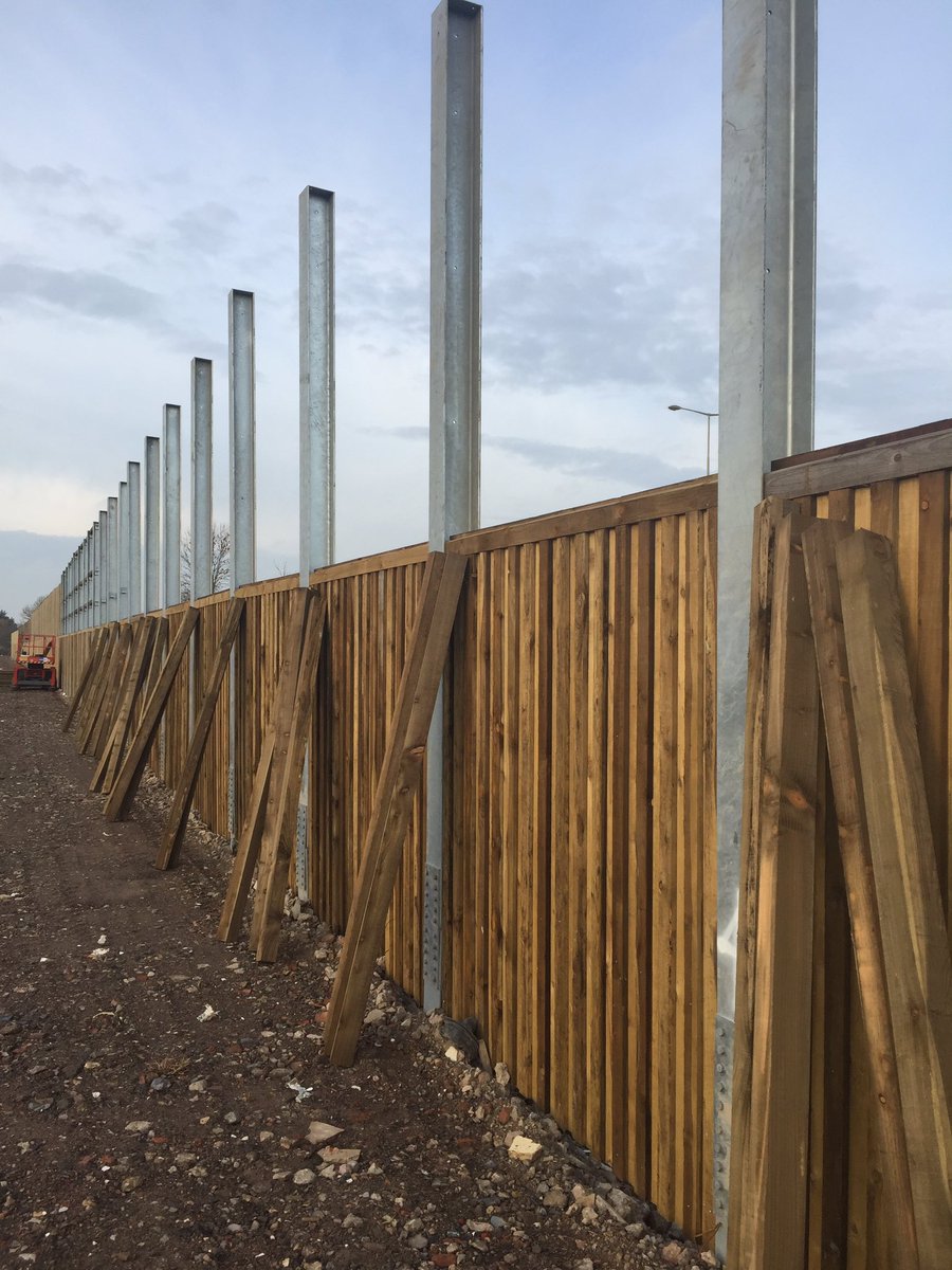 FareFenceNW's tweet photo. Coming to the final stage of our 313mtr install of Timber Acoustic fence to reduce the noise pollution from the M55 to the new build houses in Preston #fencing #preston https://t.co/1b1MU9jejq