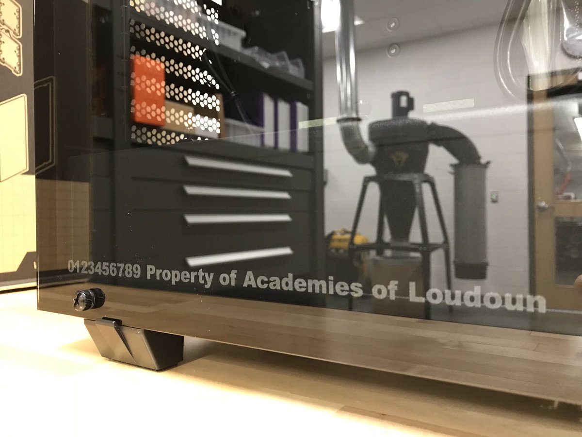 DesignMakeTeach's tweet photo. Testing engraving settings on tempered glass. Personalizing workstations for cybersecurity class. #makerspace #ACLInnovates @EpilogLaser https://t.co/Dygzaylahe