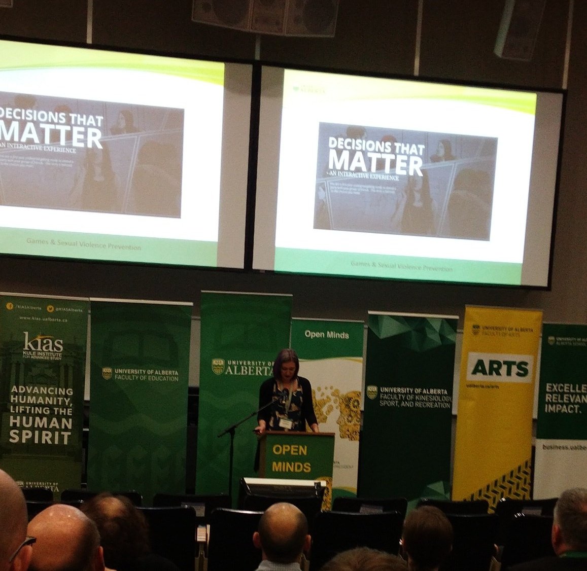 sshrcUofA's tweet photo. You've probably heard that video games cause #violence. @kenzielgordon, @UofA_Arts Grad Candidate, is speaking to how games can empower for #Prevention of sexual violence. "Decisions that Matter" had a 10% affect on rape attitudes
#OpenMinds2018 #SSHRC40 #SSHRCMatters @UofAMLCS https://t.co/H9DZjG610o