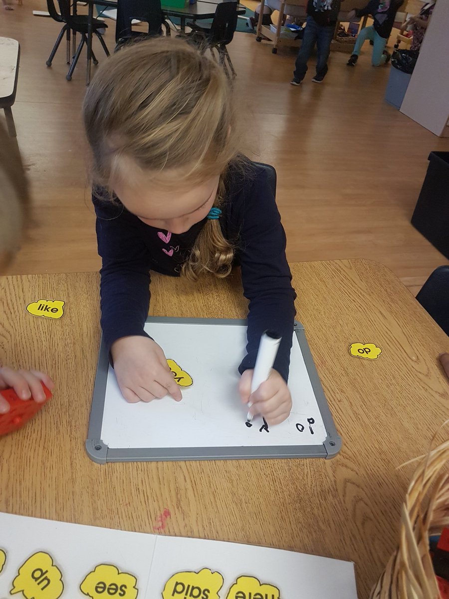 AlainaStandring's tweet photo. Evelyn expressed interest in writing a #QOTD for the class, so to prepare, she found the popcorn sight words she needed to write her question. Stay tuned tomorrow! #Kindergarten #literacy #authenicwriting https://t.co/43bC75hrNR