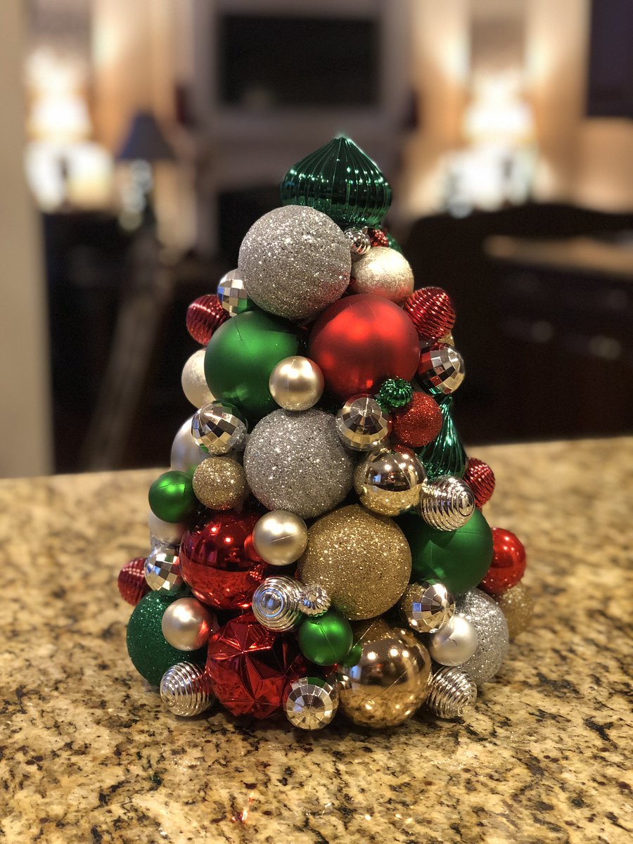 RealCKPhillips's tweet photo. Just a gal and her glue gun...😉 These days I’m part Buddy the Elf, part Martha Stewart. Here’s the wreath and topiary tree I finished today. 😍 https://t.co/WnTQ7e9GRE