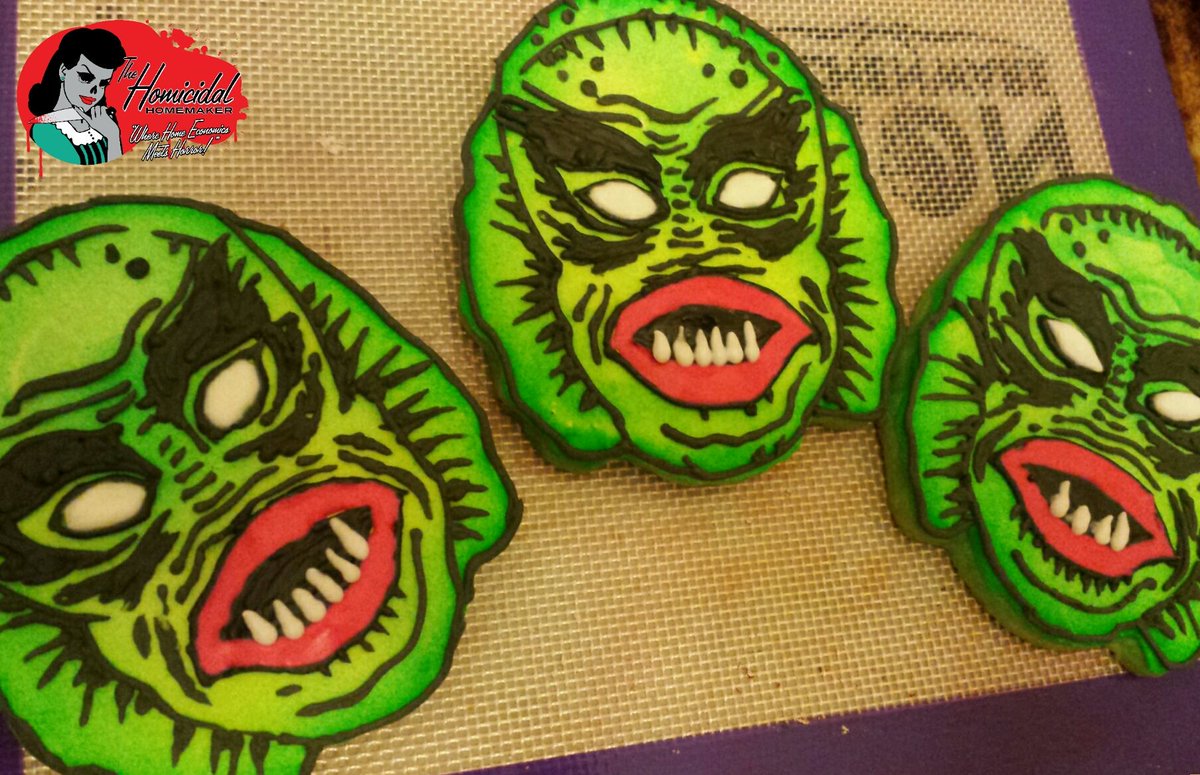 HomicidalKaci's tweet photo. This is what happens when I have extra dough, frosting, and a couple hours to spare... Ben Cooper Creature Mask Cookies. https://t.co/Z0dQNa1eeB