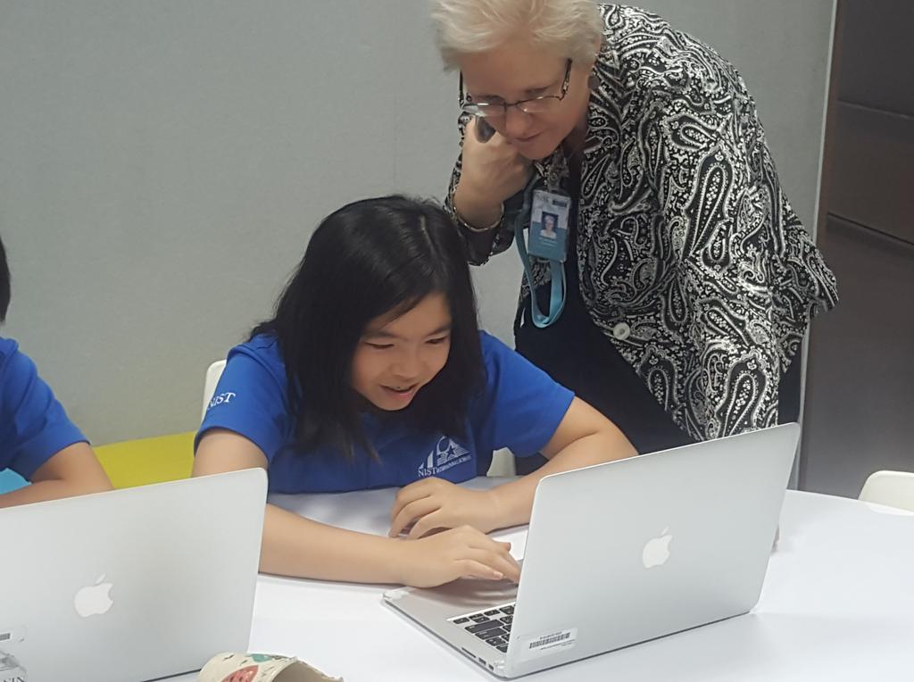 Debugging the code that programs characters to dance as part of the Hour of Code. #NISTis creating new moves during #CSedweek <a href="/NISTSchool/">NIST Int. School</a>