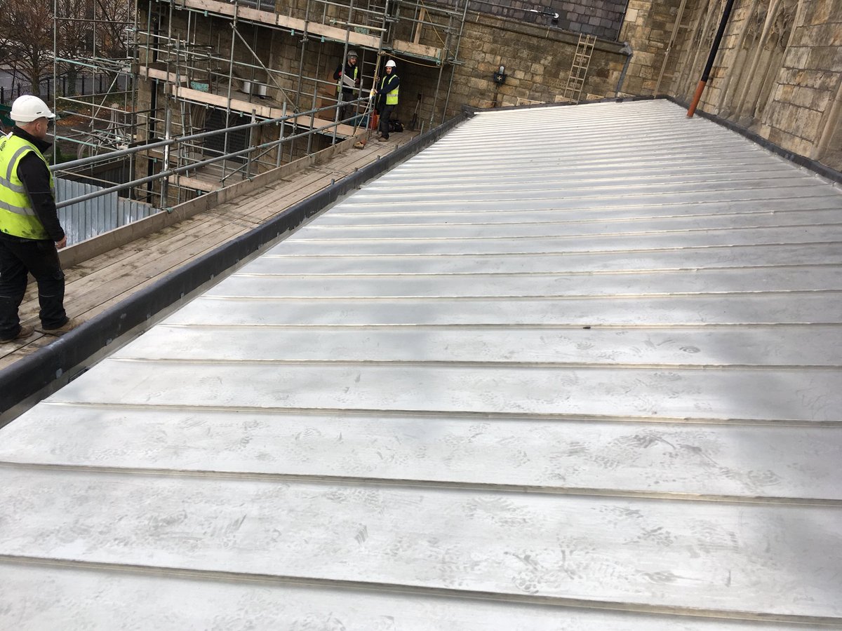 castle_roofing's tweet photo. Recently completed stainless steel standing seam roof to the north aisle of Salford cathedral #salford #standingseamroof #stainlesssteel @stoneedgeuk https://t.co/APnnAh68Mn