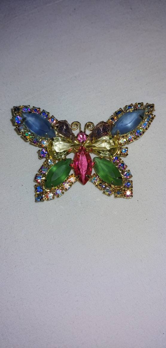 Excited to share the latest addition to my #etsy shop: Vintage multicolored rhinestone butterfly brooch 70s jewelry gifts for mom sister daughter #brooch #butterflybrooch #butterflies #multicoloredjewelry #goldtone #vintagebrooches #70sjewelry etsy.me/2r8kUB0