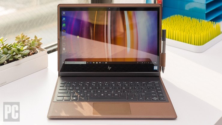 PCMag's tweet photo. If you're looking for a beautiful laptop to serve as an executive status symbol, a sometimes movie-watching machine, and an email platform, the HP Spectre Folio is hard to beat: https://t.co/vhSFrmj5Yx https://t.co/Q49SeYNbYZ