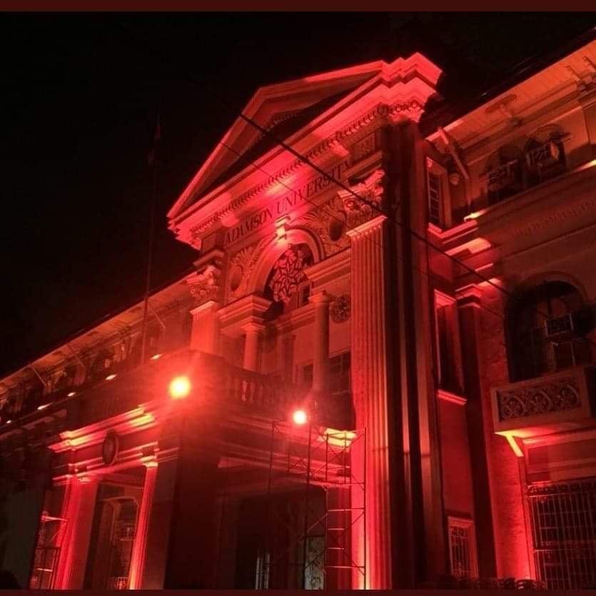 jeckified99's tweet photo. The Adamson University SV Building was lit to the University of the Philippines' iconic Maroon after losing to what can be considered as the game of the season. Now that's the spirit of a true winner. Congrats UP! We will be cheering for you. #AdamsonFalcons #UAAPSeason81 https://t.co/cIv5PNIKXA