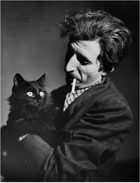 Deny Fear on Twitter: "Here's Gjon Mili with his cat Blackie, 1946… "