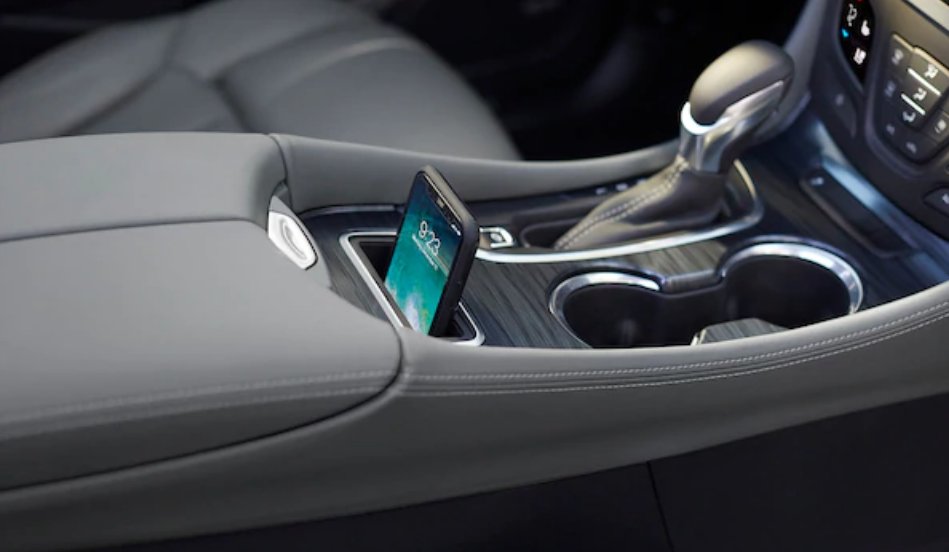 biggscadillac's tweet photo. Who has time to fumble around with wires? Keep your hands on the wheel and stay free from distraction with the #BuickEnvision's wireless charging station! https://t.co/j3qWZ5kO17