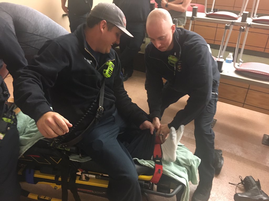 PVASMedics's tweet image. Tweet 3/5: Once pt is supine on stretcher and caregivers control their assigned extremity, one of the two providers on the legs straddles the patient facing their feet and sits, the other applies soft restraints to ankles. #EMS #Ambulance #EMSSafety @PtSafetyEMS