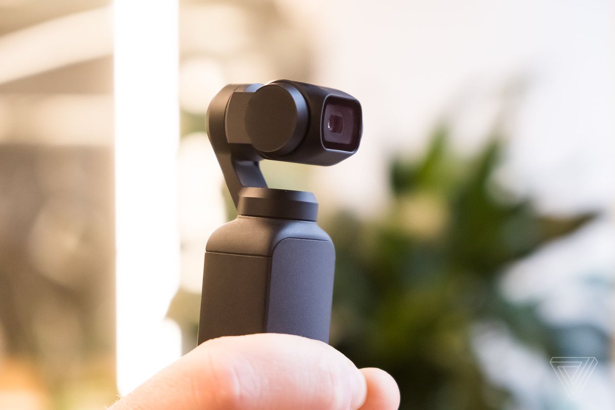 verge's tweet photo. DJI’s Osmo Pocket is a tiny handheld gimbal that shoots 4K footage https://t.co/37bf3EJ0J0 https://t.co/CtOzR4HzAg