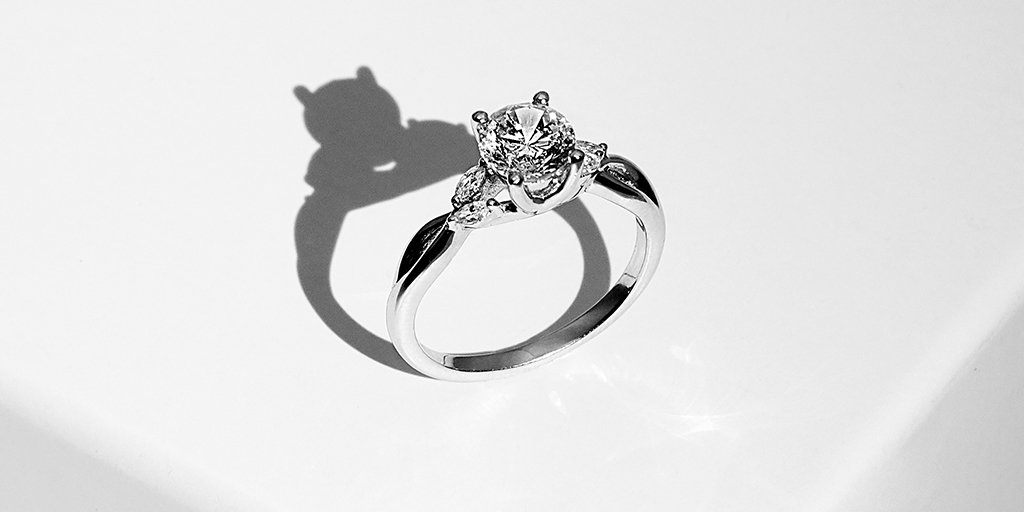 Create a unique ring by choosing beautiful design details like the ones on this multi-stone ring. It features a twist band, accent stones, &amp; a unique setting for your diamond. Visit us today &amp; choose yours - ow.ly/UZyW30mpZfA

#EngagementRings #DiamondRings #Diamonds