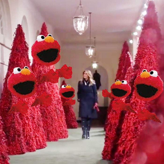 My take on the red Christmas trees! Everyone needs a hug from Elmo! #sesamestreet #freehugs #whitehouse #happy #redtrees #elmo