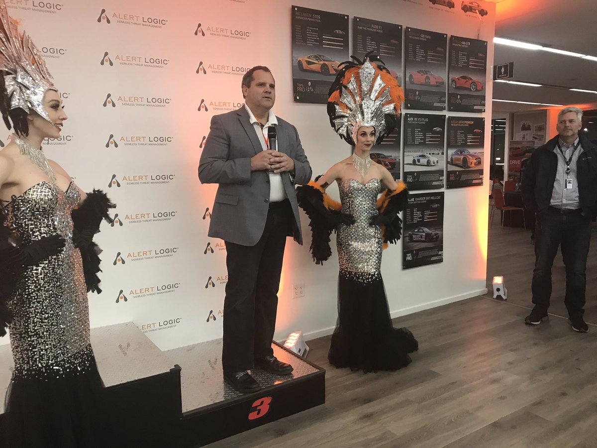 girardmaxime33's tweet photo. RT digitalcloudgal: Bob Lyons, CEO, Alert Logic welcoming guests at the Exotic Racing Event sponsored by alertlogic at the Las Vegas Speedway. #SIEMless like a 🏎 is built for speed #AWSreInvent cc: RealTonyBradley sarbjeetjohal TmanSpeaks https://t.co/xwPp0Mbmex
