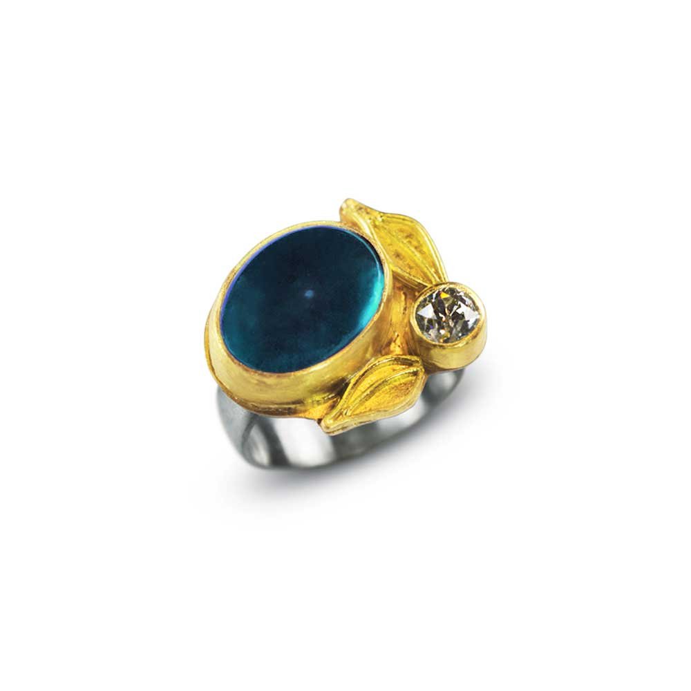 HAPPY HOLIDAYS! SPECIAL 15% OFF!  USE CODE SNOW18
A favorite, custom made with customer's 1 carat diamond, blue topaz, 22k and 18k white gold band.  #customorders #goldsmith #leafrings #ancienttechniques #coloredstones #diamondstatementrings