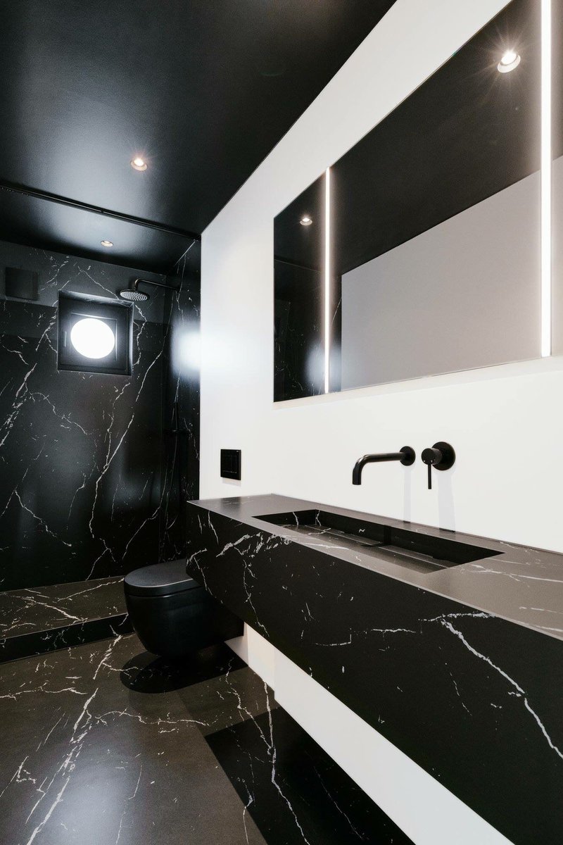 NeolithS's tweet photo. This Neolith® Nero Marquina totally takes us back to black! The black toilet takes it to the next level too. A great choice to add a monochrome mood in your bathroom.
City House in Brussels designed by Michel Penneman.
#Neolith #SinteredStone #Neolithskin #Bathroomdesign https://t.co/K58GfkyjtW