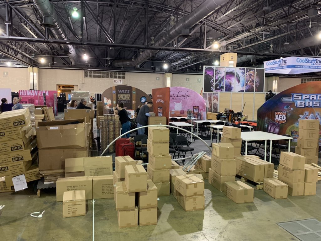 rsdancey's tweet image. #PAXUnplugged setup underway! #warchest #spacebase #ScorpiusFreighter #catlady #TinyTowns #alderac