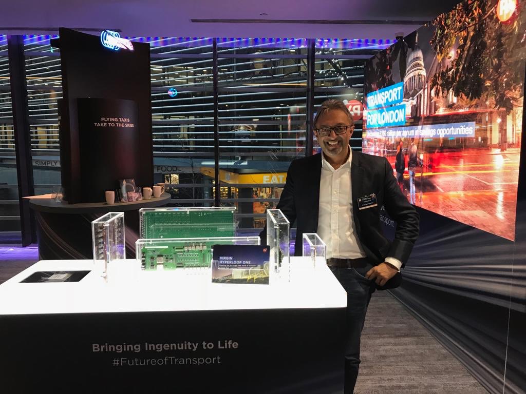 The man behind the machine! @HyperloopOne’s <a href="/HarjDhaliwal/">Harj Dhaliwal</a>, MD Middle East &amp; India, posing with our circuit boards - the building blocks that powered the first DevLoop tests. To find out more about what makes #hyperloop so ingenious, take a look here bit.ly/2N6R2lX