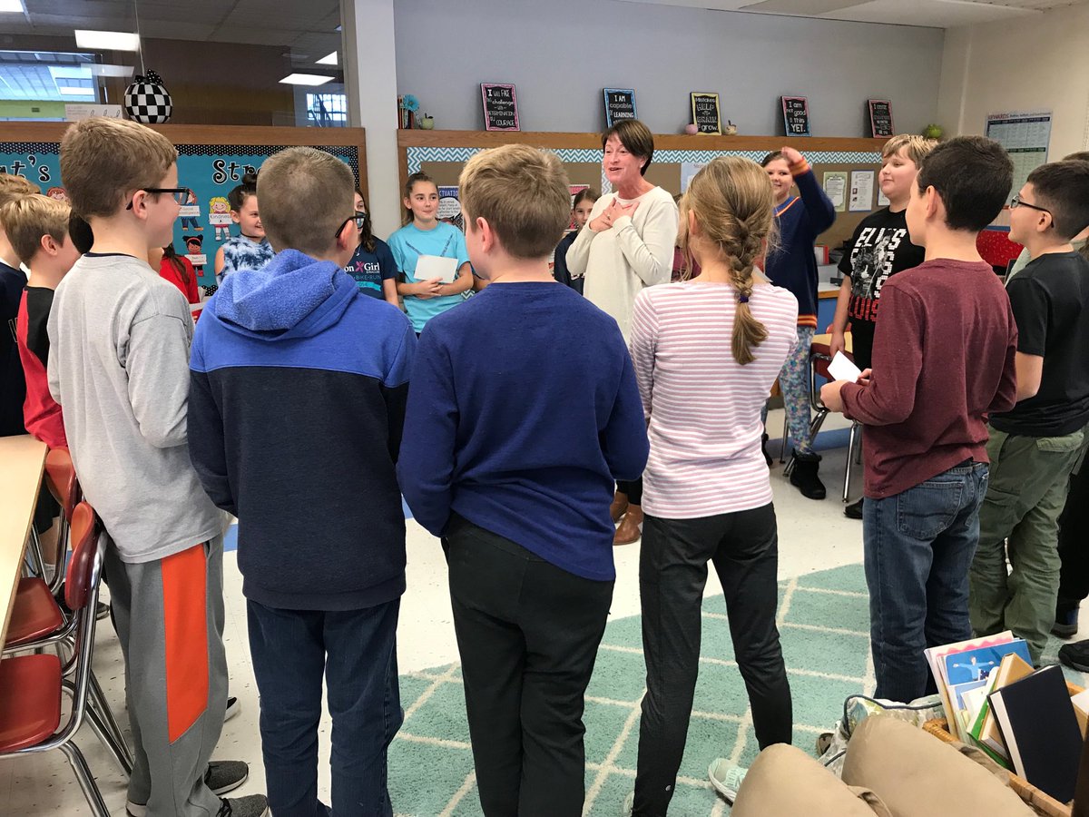 Mr. Ramsden’s class doing a choral reading of “The Road Not Taken” for Mrs. Barbuto .