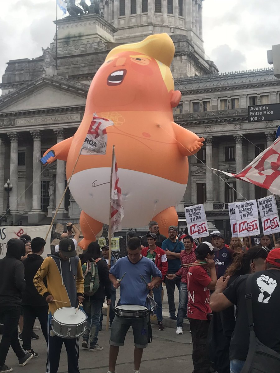 RichardEngel's tweet photo. Baby Trump made it from anti-Trump protests in London to fly in Argentina for G20 demonstrations. https://t.co/IgD4ogStLG